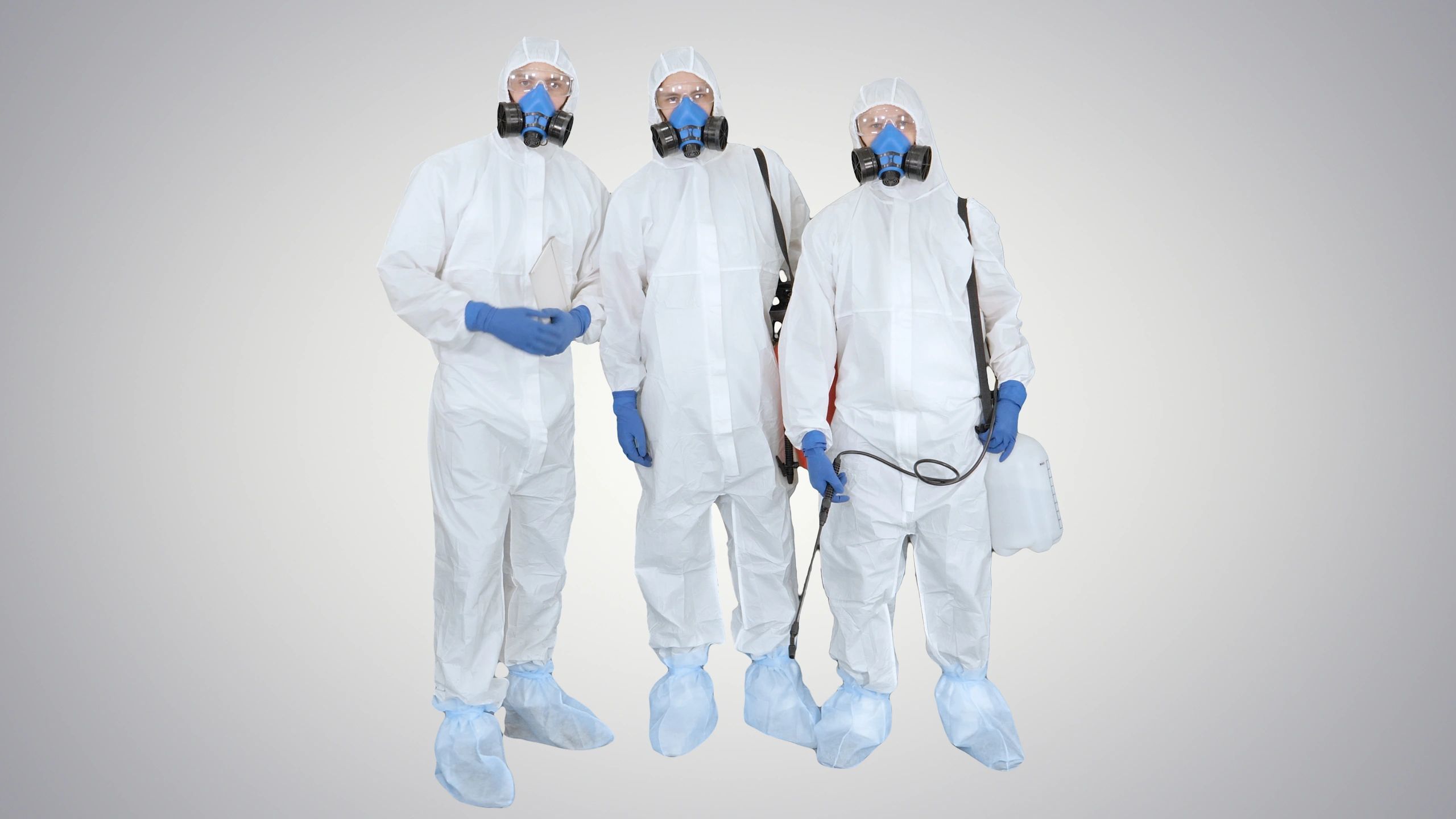 Cleaning professionals walking with supplies